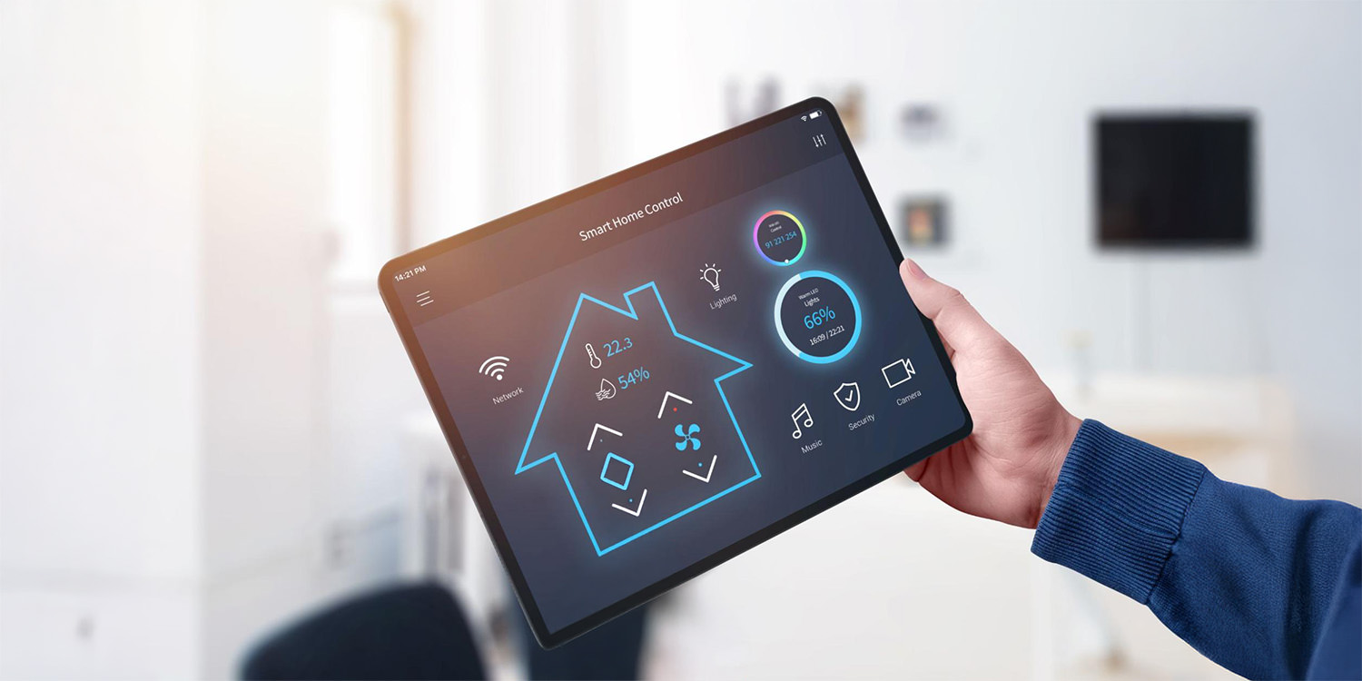 A tablet displaying a smart home system interface, showing controls for lighting, climate, security, and entertainment.